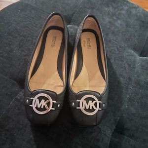 Michaels Kors flats or slip-on shoes